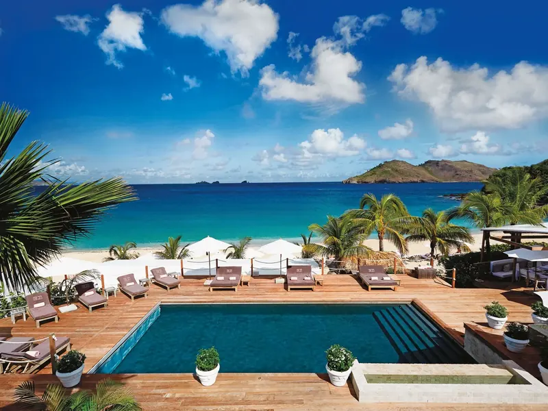 Beachfront resort pool and sun loungers, Saint-Barthélemy