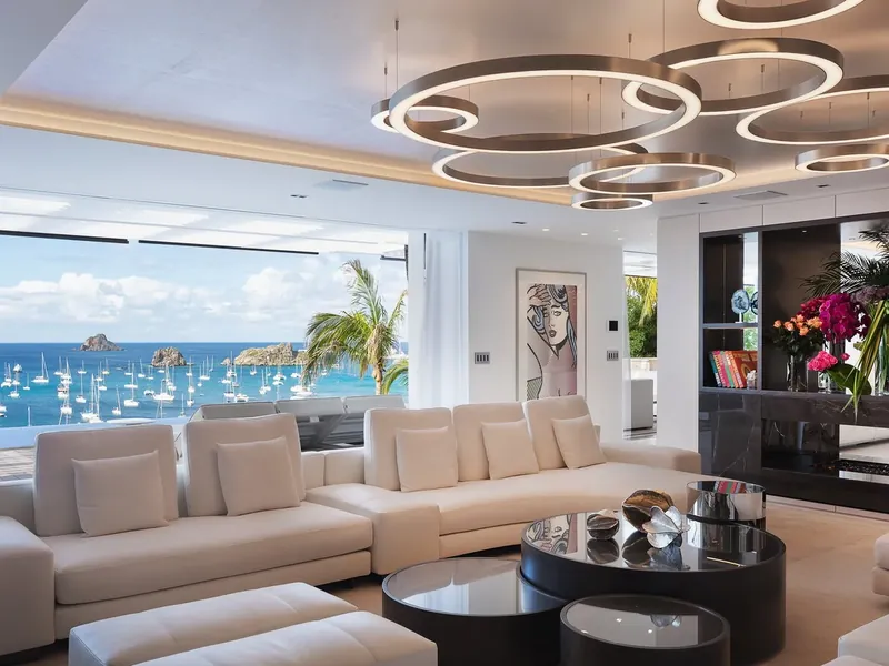 Villa living room prepared with fresh flowers and an ocean view, Saint-Barthélemy